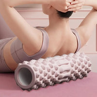 Rouleau de massage musculaire rose pour Pilates