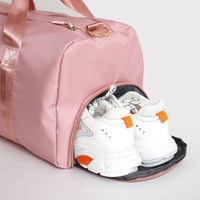 Sac de sport rose avec compartiment à chaussures