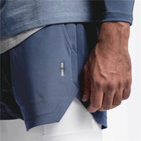 Short de sport bleu pour homme avec doublure